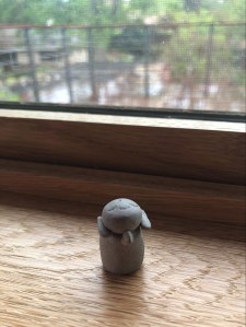 Japanese Buddha on Tao's windowsill.